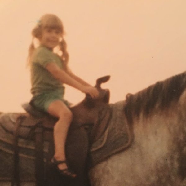 Jennifer at age 14 with her horse